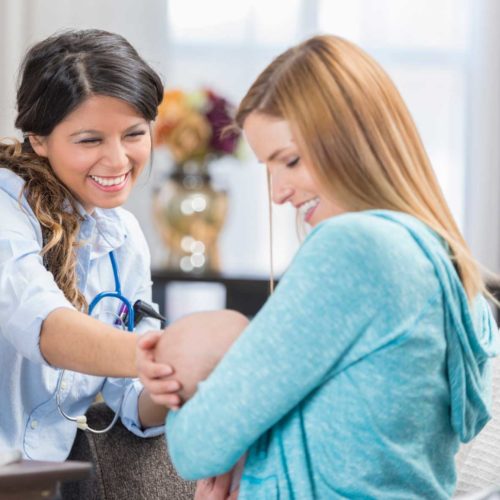 Lactation Specialist Helping Mother With Baby | AngelEye Health